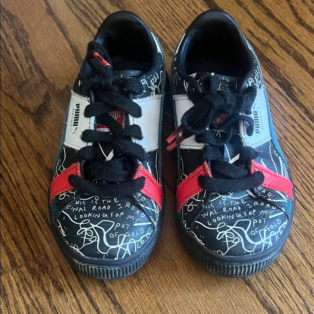 Puma Black and Red Sneakers with Playful Design
